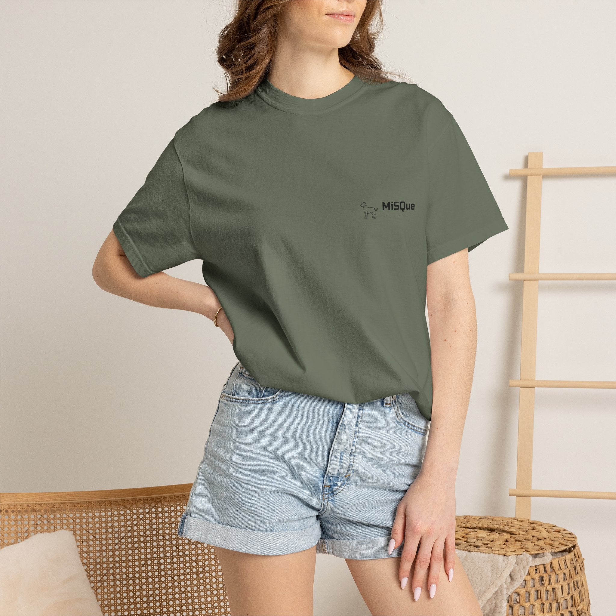 Woman wearing MiSQue The Camp T-shirt in dark green
